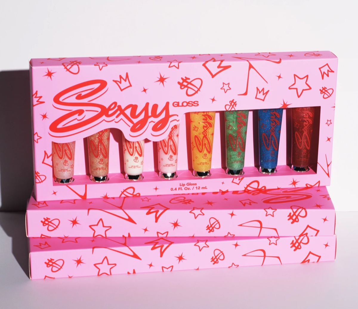 The finished retail line: Sexyy Gloss, eight shades.